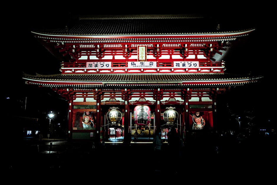 A captivating night photograph of the iconic Senso-ji Temple in Tokyo, Japan, illuminated beautifully.